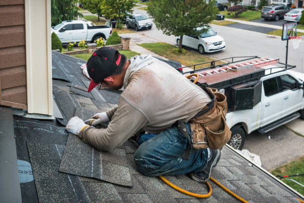 Professional Roofing technician working in Billings, NY